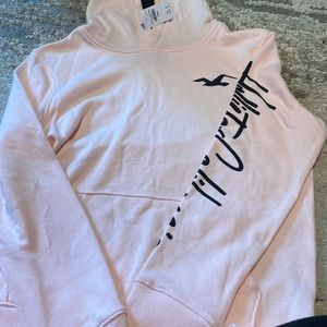 Hollister xs hoodie in light pink.
